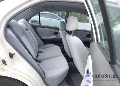 2001 Mitsubishi Mirage Es z USA, uszkodzony, nr VIN JA3AY26C11U038582